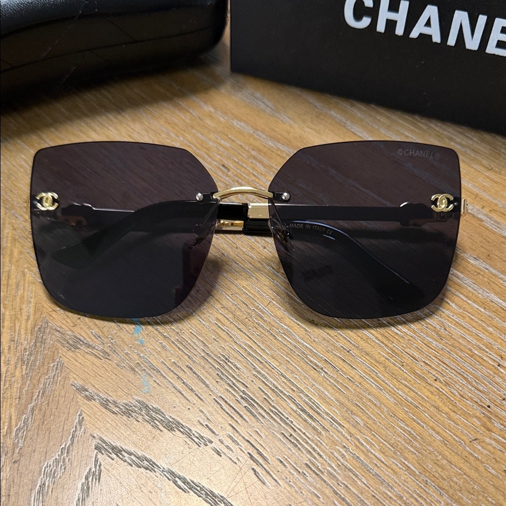 CHANEL Black and Gold Rimless Square Sunglasses